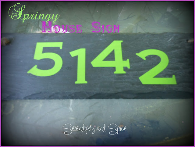 blog+082 Spring House Number Sign Finally, after the 5th package was delivered my husband suggested making a sign for the door.  Well, I wasn't just going to write the house number on a sheet of paper and tape it to the door like he suggested.... men! :)  I went to Michael's and found this cute slate sign for just $2.99!