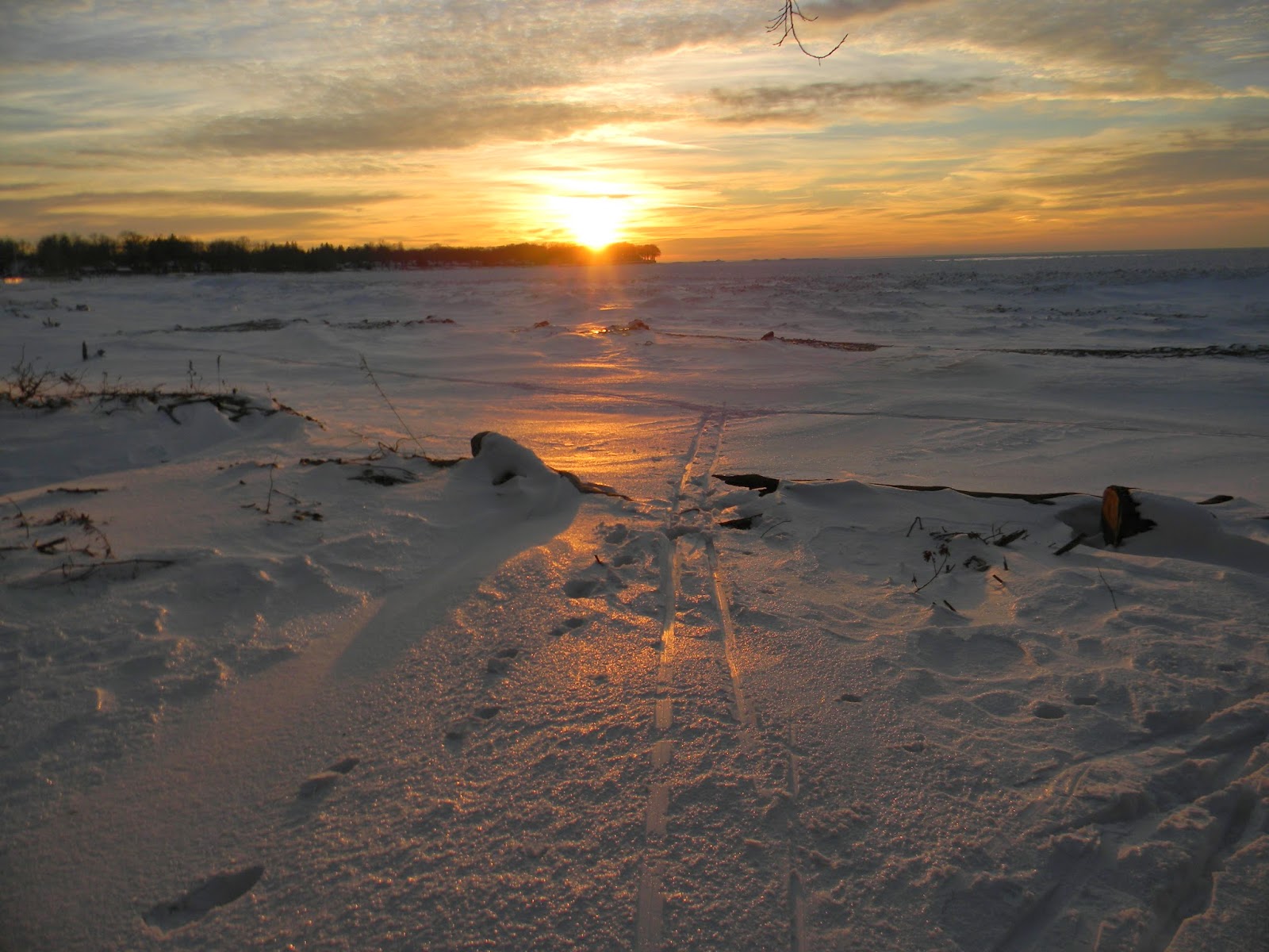 RuthieQ Cross country skiing at sunset on Lake Erie shoreline