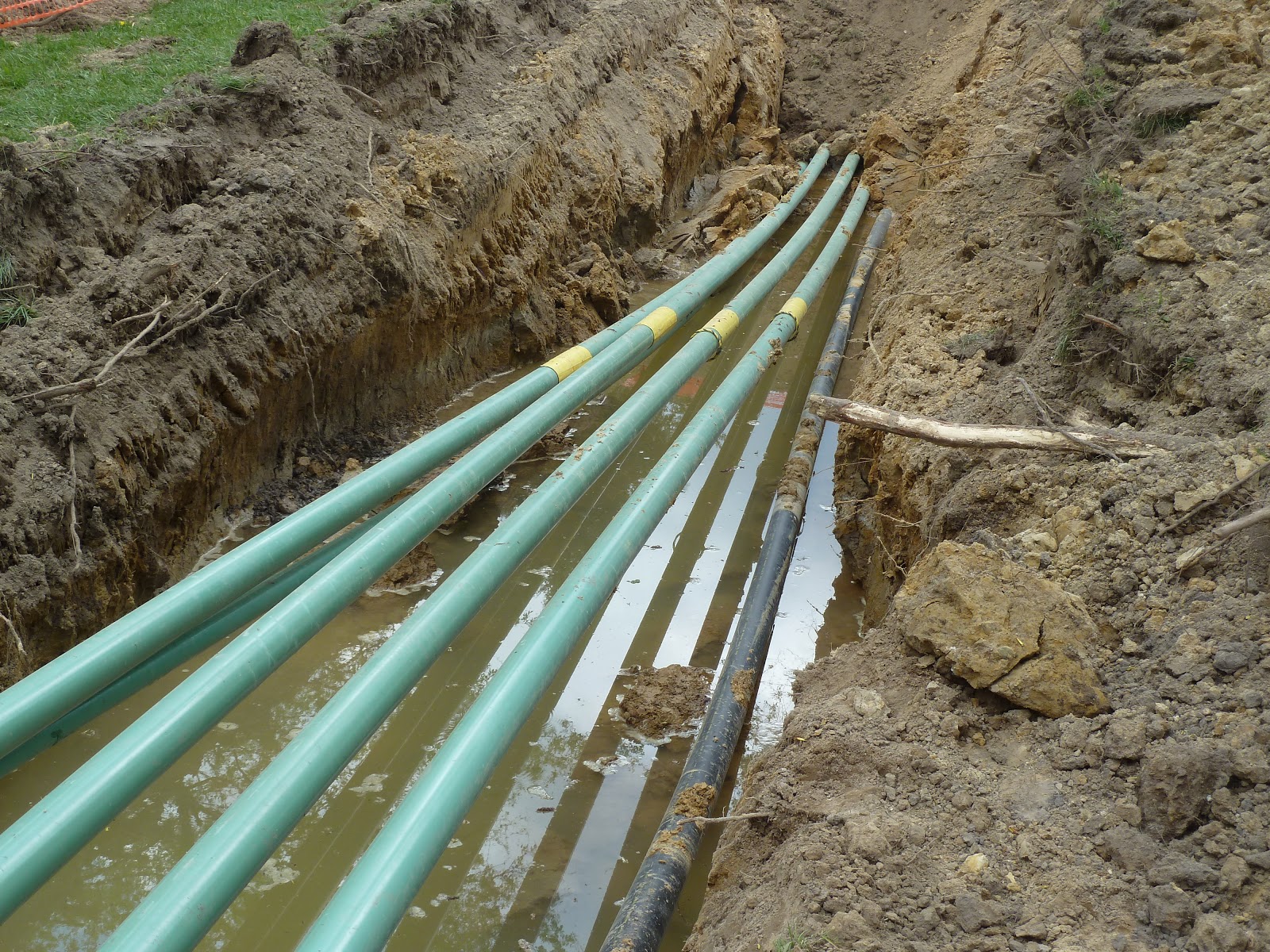 Adrian Oil and Gas Pipeline Connected to Well Head in Heritage Park