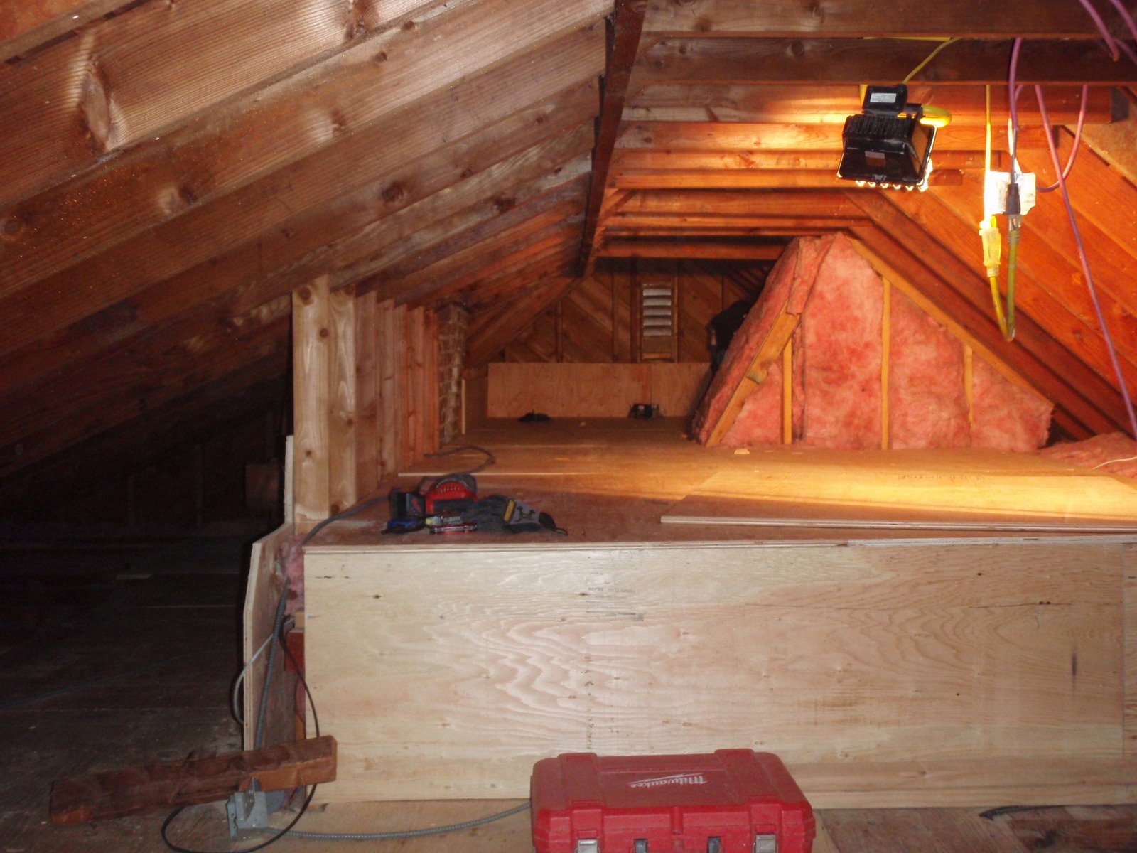 Home Pride Contracting Installing plywood in an attic