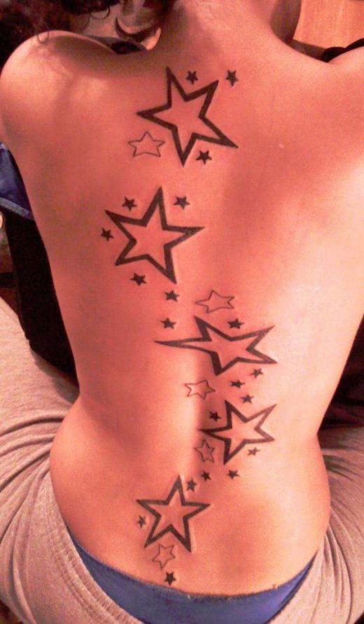 Tattoo On Middle Back. lower ack star tattoo,