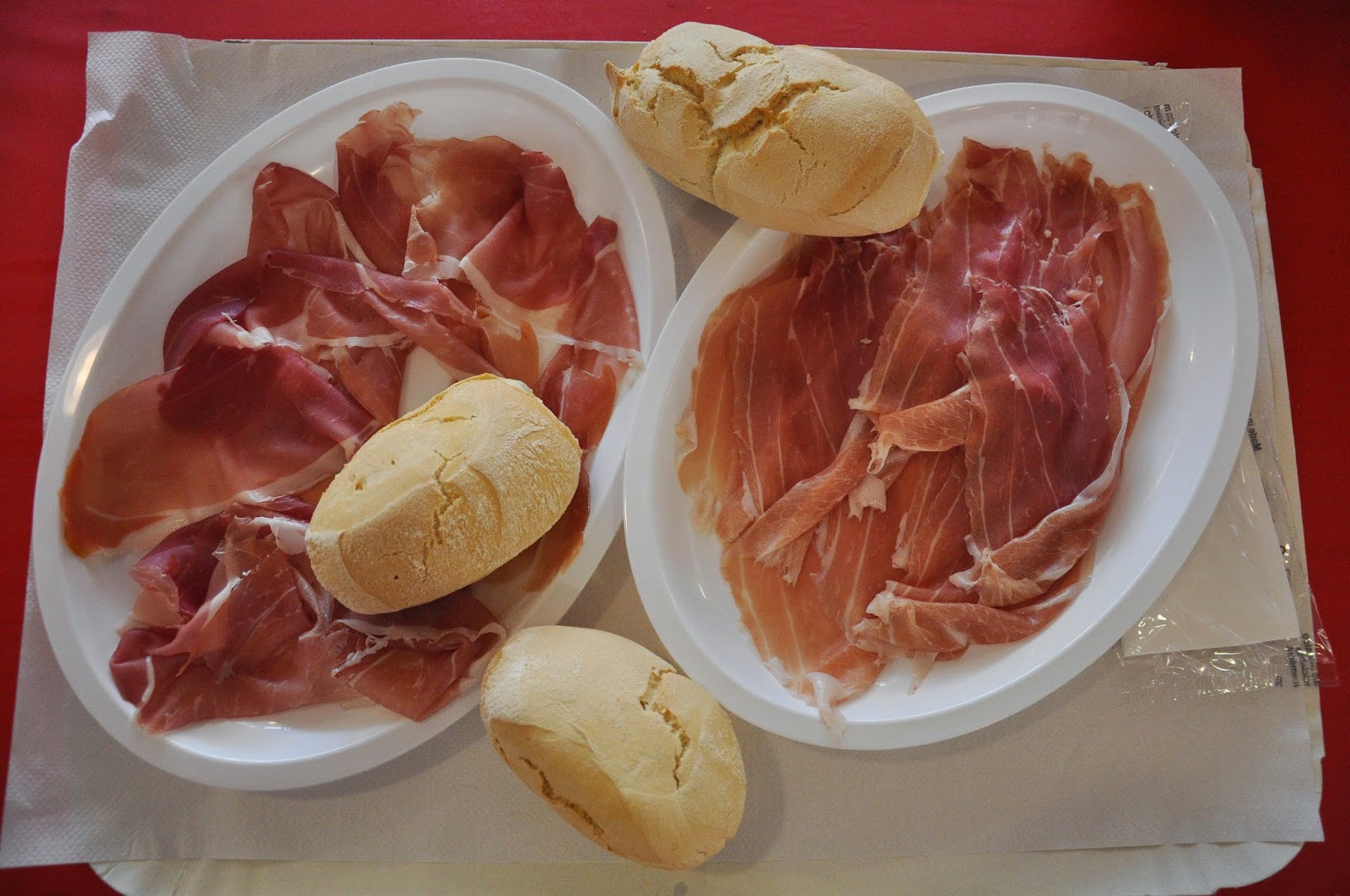 Plates with prosciutto in the prosciutto marquee in Montagnana, Veneto, Italy