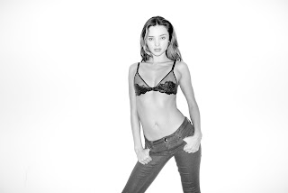 Miranda Kerr strikes a pose in a bra and jeans for photographer Terry Richardson