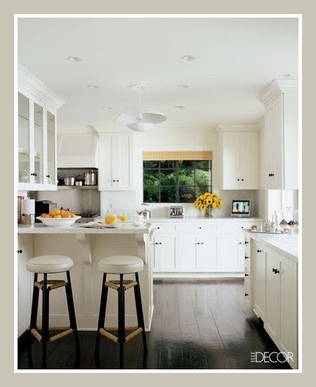 White Kitchen with A Dark Floor | Content in a Cottage