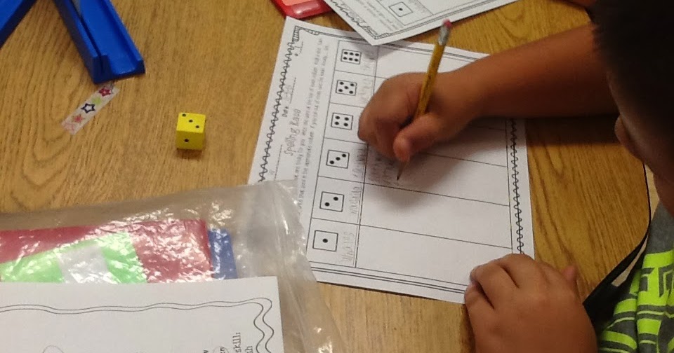 to the UNIcorner Spelling Dice Race {Freebie?!}