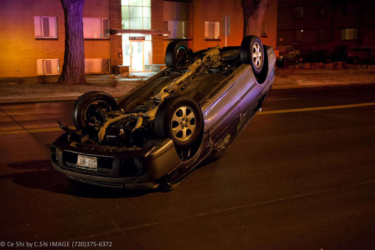 CE SHI PHOTOGRAPHY A Car Flip over on DU Campus
