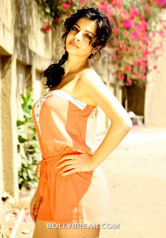 Vedhika in an orange strapless romper - Vedhika unseen latest pics- HOT!