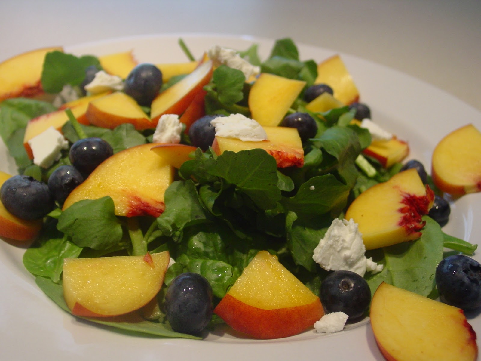 The Dirty Floor Peach, Blueberry and Goat Cheese Spinach Salad