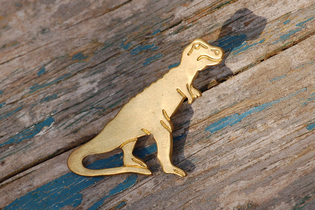 https://www.etsy.com/listing/202267138/dinosaur-brooch-brass-tie-pin?ref=shop_home_active_10&ga_search_query=tie%2Bpin
