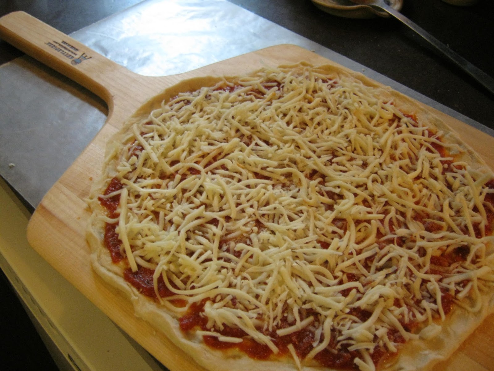 Let the Feasty Begin Pizza from the er Kettle Pizza Kit