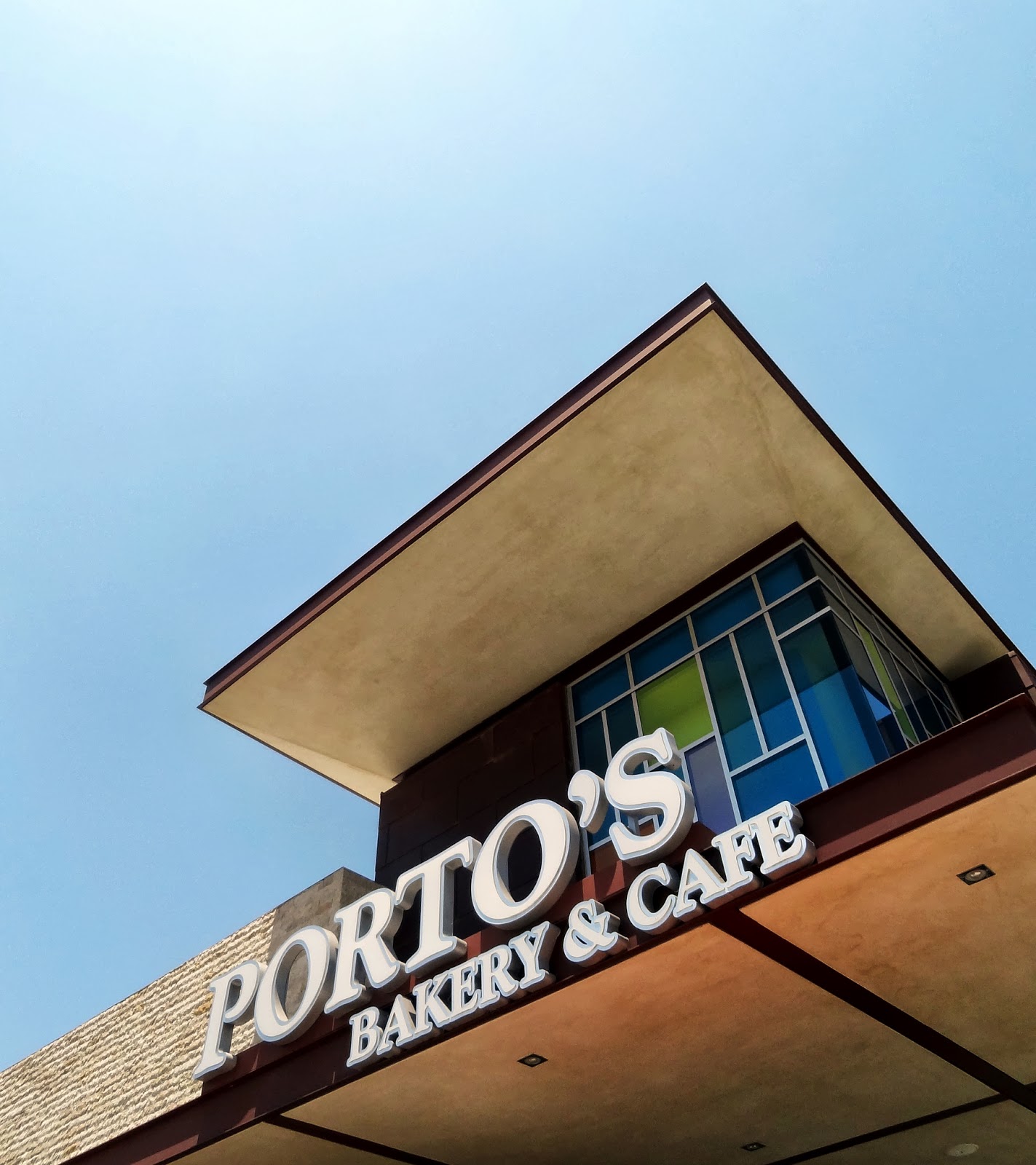 Alex's log Porto's Bakery & Cafe