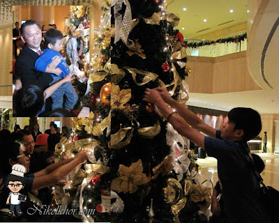 tree christmas lighting ceremony pj hotel hanging wish they their