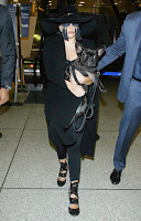 Lady Gaga holding her dog