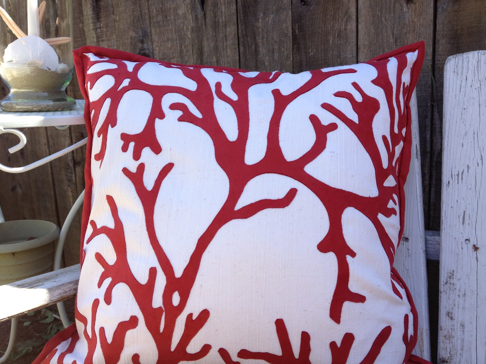 pottery barn coral pillow