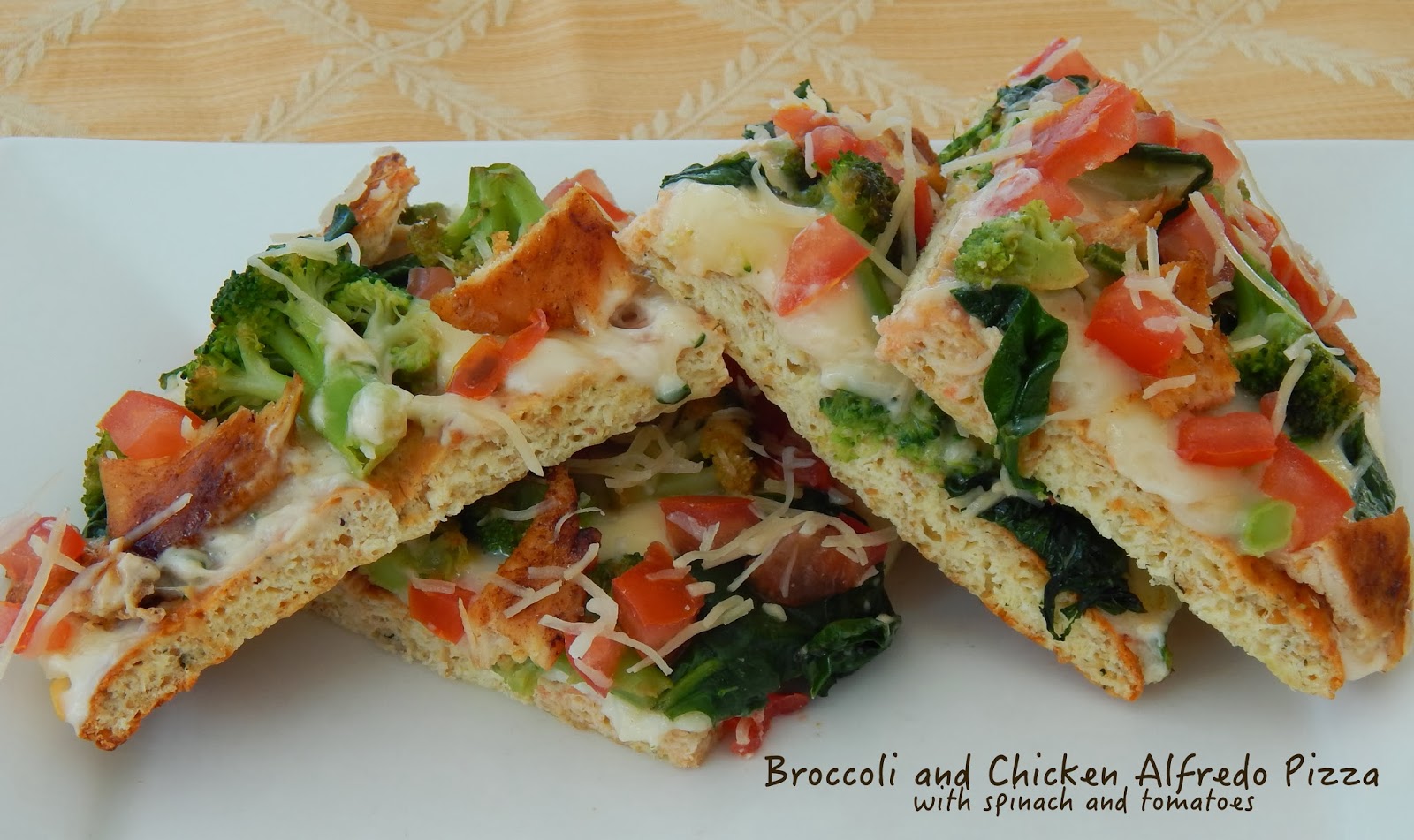 Broccoli and Chicken Alfredo Pizza with Spinach and Tomatoes Cut The