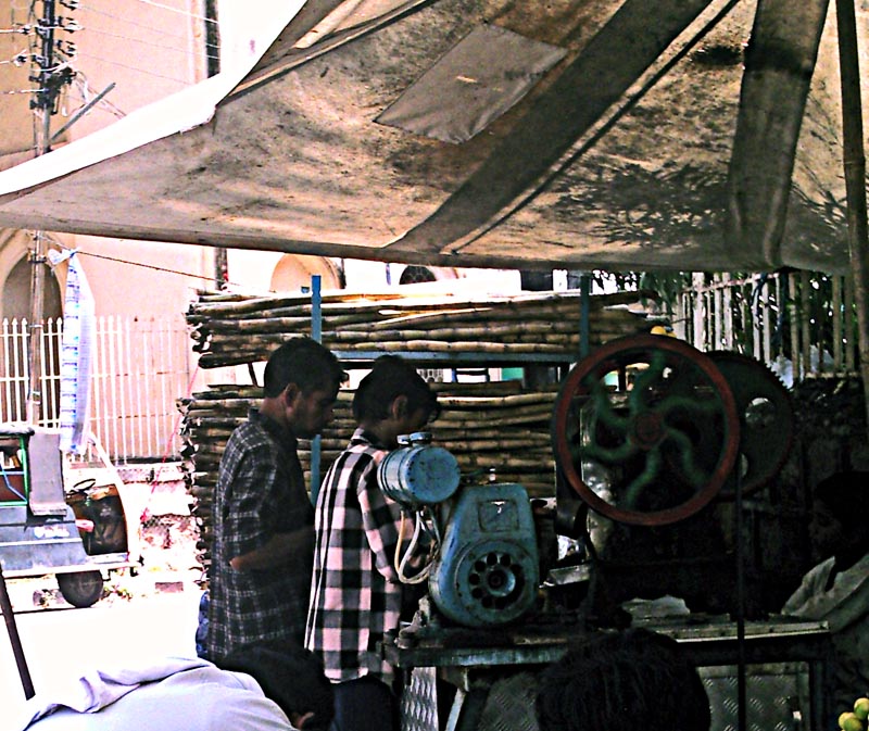 Stock Pictures Sugarcane juice vendors