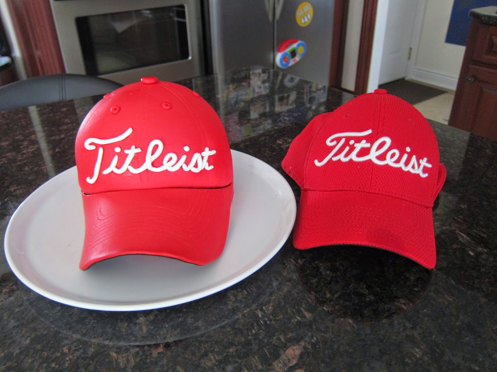 red titleist hat