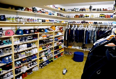 Chris Brown's Shoe Closet Chris has an impressive sneaker collection lined around the top shelves surrounding the closet.