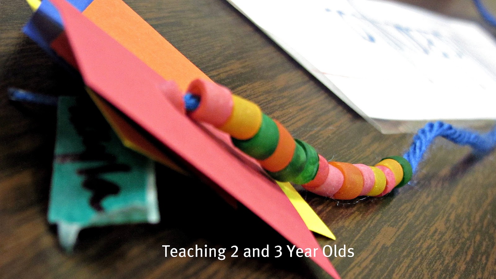 Teaching 2 and 3 Year Olds Rainbow Threading Necklaces