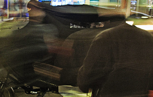 Cigdem Aydemir, Burqa Clad Rickshaw, with passengers.