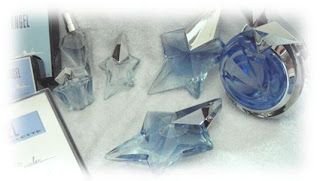 Image of Angel perfumes EDT and EDP, in different volumes and different shaped star bottles.