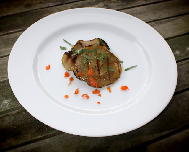 plated dish, served with chopped mirasol pepper, basil chiffonade