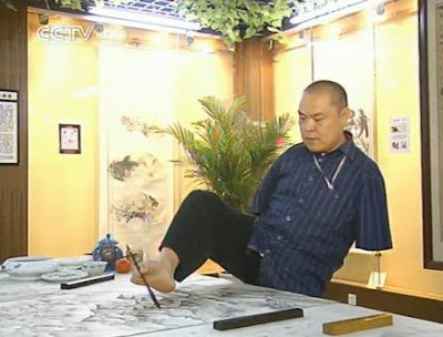Chinese Artist Huang Guofu Paints With Mouth And Feet