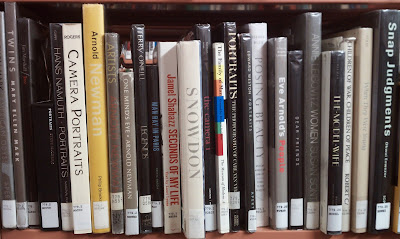 Photography books in the stacks at the Arlington County public library.