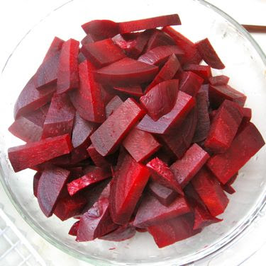 boiled, peeled, and sliced beets, ready for pickling
