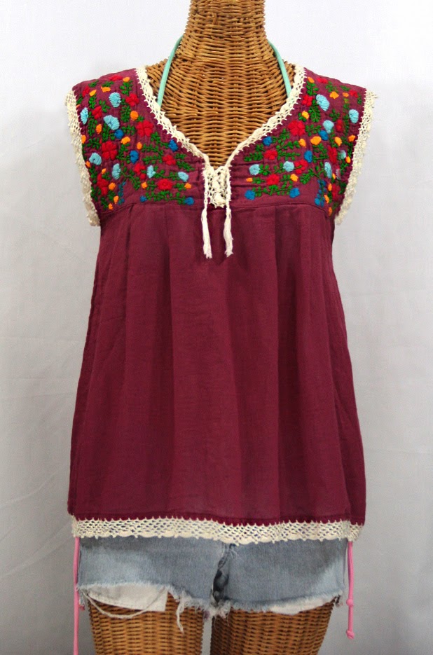 http://www.sirensirensiren.com/shop/new!-embroidered-peasant-tops/marbrisa-sleeveless-peasant-blouse/embroidered-sleeveless-mexican-blouse-marbrisa-burgundy