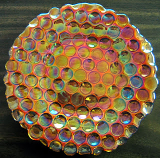 http://www.decorativedishes.net/art-glass-iridescent-exotic-orange-purple-marble-mosaic-plate/