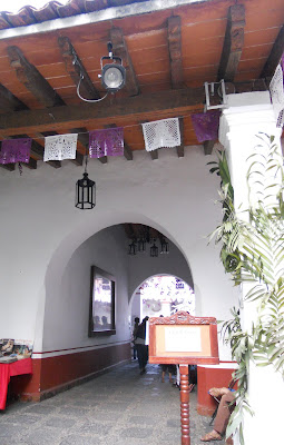 View from the inside of the garden to the first fountain and main entrance