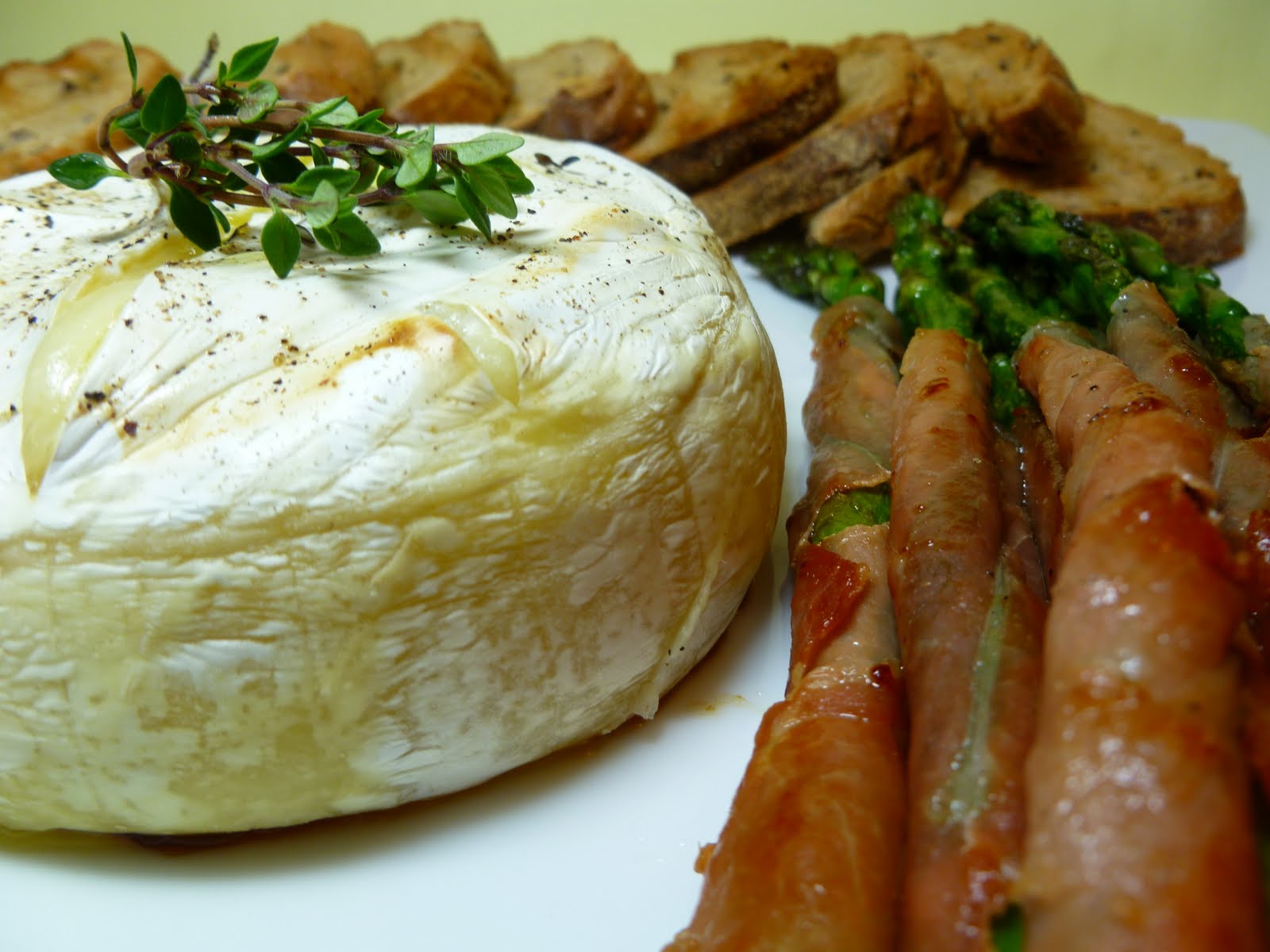 Vanilla Clouds and Lemon Drops Baked Brie with Asparagus & Prosciutto