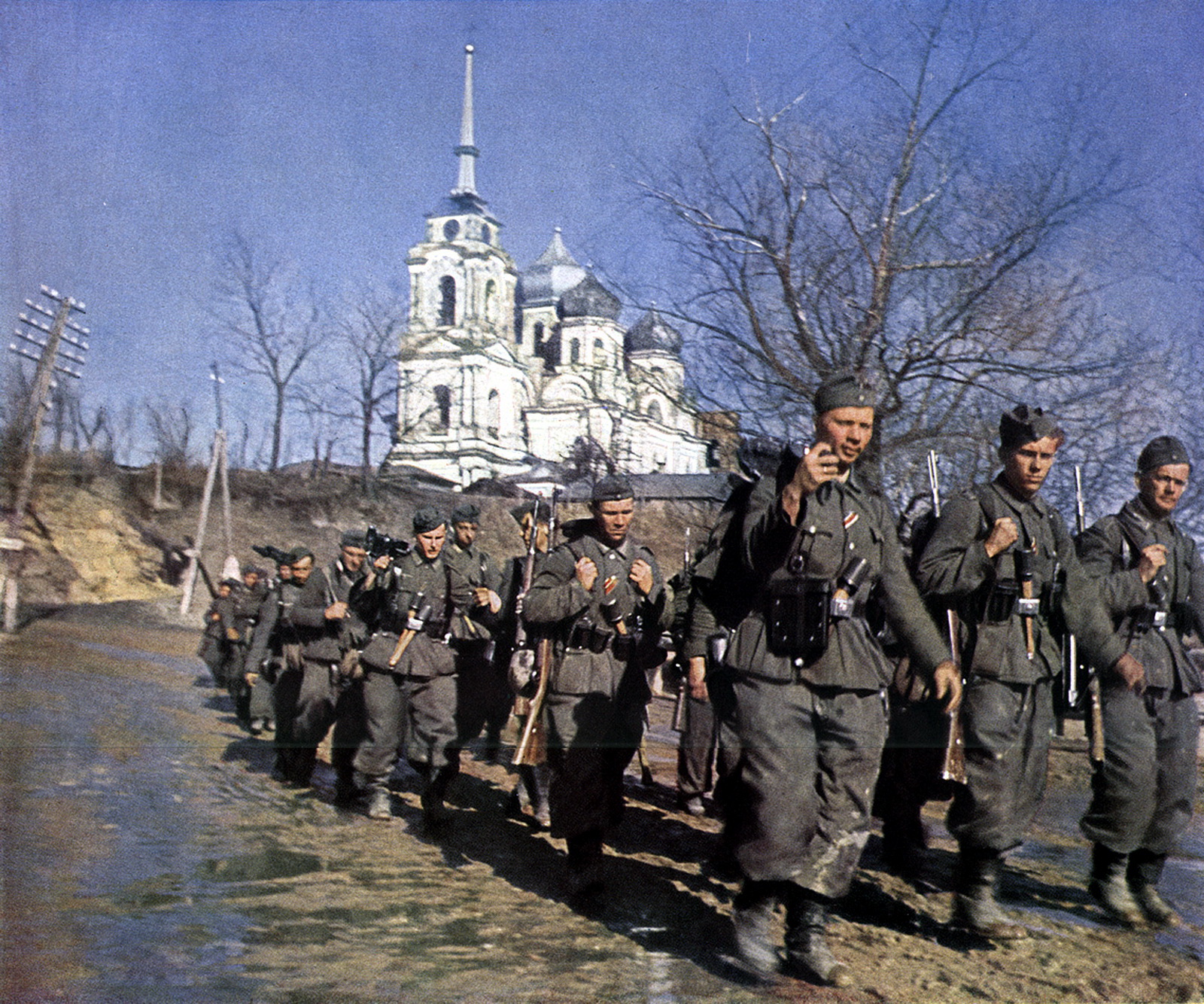 World War II Pictures In Details: German Soldiers March To The Front In Fall Blau