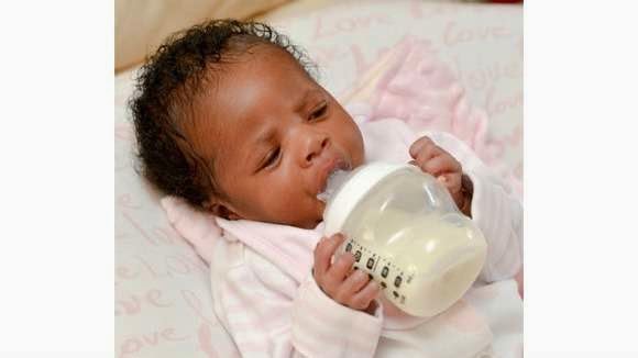 Wow! Newborn Baby Holds Her Own Feeding Bottle