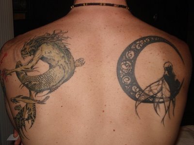Often moon tattoo designs are popular as they can compliment other tattoos