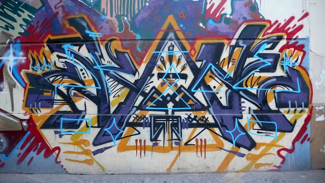 graffiti street art in barrio brasil, santiago de chile