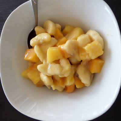 Tropical Fruit Salad:  A fruit salad made with pineapple, mango, and banana tossed in coconut milk.