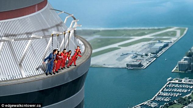 Look...no hands! New 'ride' gives adrenaline junkies chance to walk around the outside of CN Tower