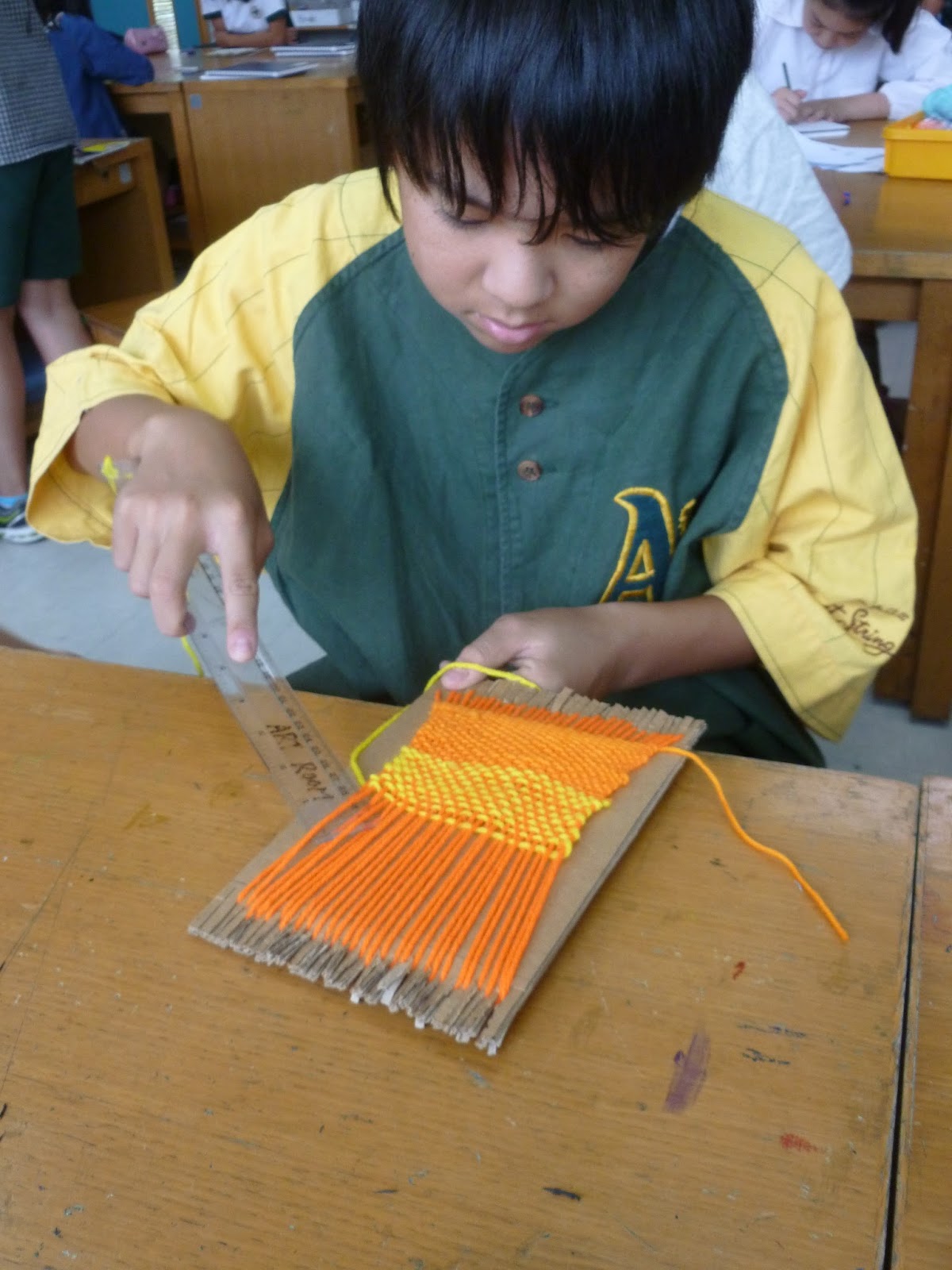 Miss Kristin's Art Room Cardboard Loom Weaving with P6! We cut and