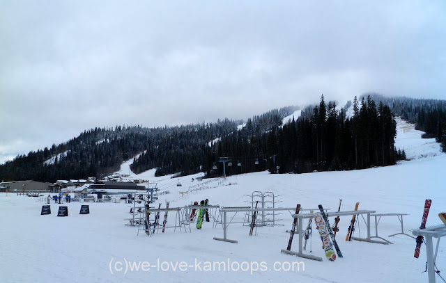 Racks hold the skis while the skiers have lunch