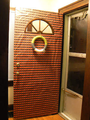 mylittlehousedesign.com Christmas paper wrapped front door