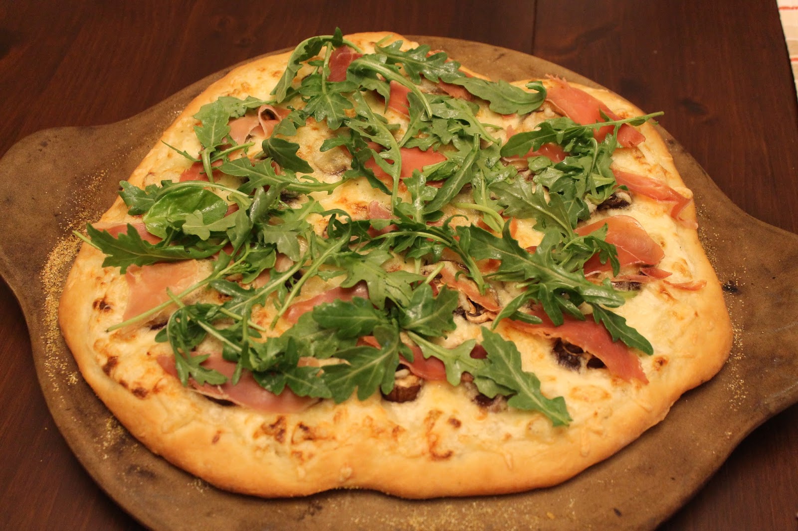 White Pizza with Lemon Arugula and Prosciutto
