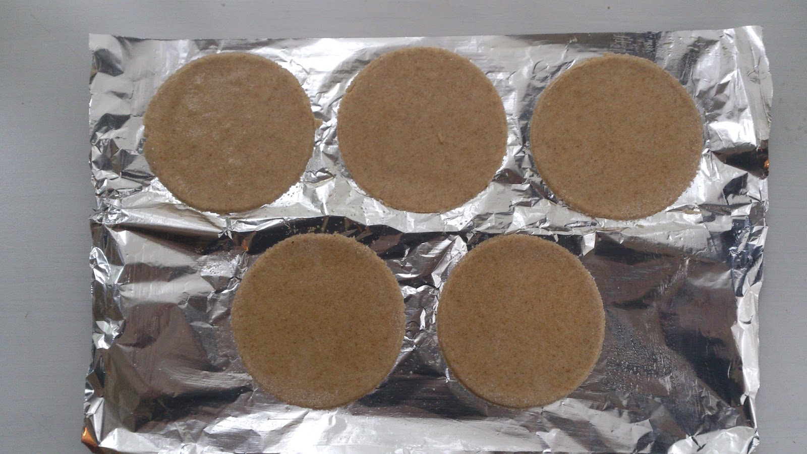 Ancient Hellenic honey cakes Baring the Aegis