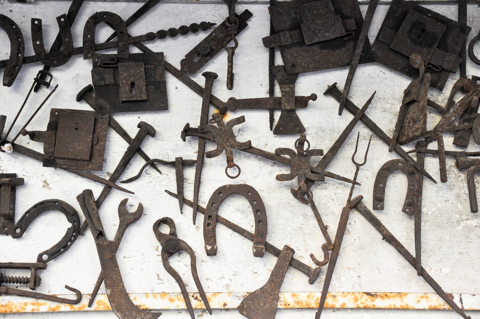 Decorations on the exterior walls, The metalsmith workshop, Castello di Alboino, Feltre, Veneto, Italy
