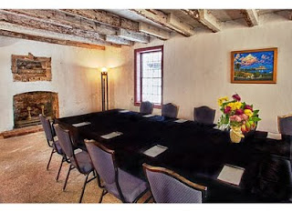 A Premier Small Retreat Destination 6 Table+and+fireplace+view St. Francis Inn St. Augustine Bed and Breakfast