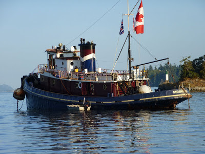 Seahorse Tugboat - flying Canadian flag - Ganges Harbor, Salt Spring Island BC