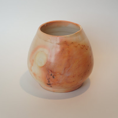 Stunning foil saggar fired raku ceramic vase by Lily.