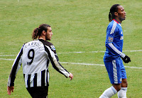 Drogba and Carroll in Chelsea against Newcastle United