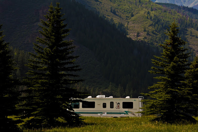 A motorhome with a large Betty Boop decal parked at Sylvan Lake State Park.